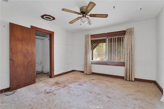 unfurnished bedroom with ceiling fan and light carpet