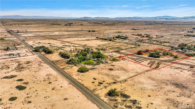 bird's eye view featuring a mountain view and a rural view