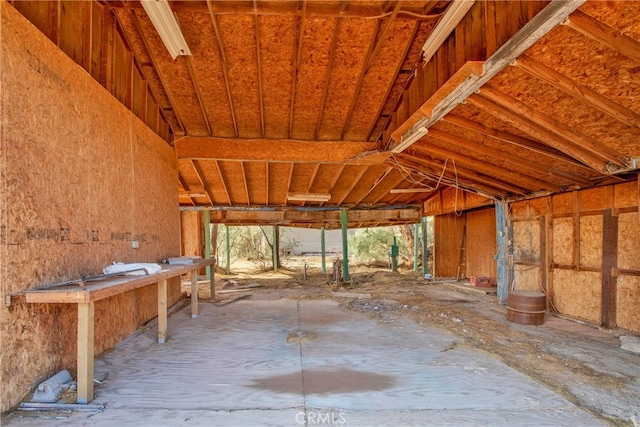 misc room with lofted ceiling