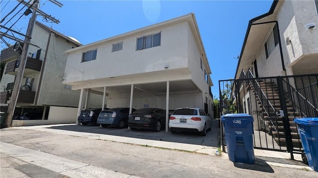 view of building exterior with a carport