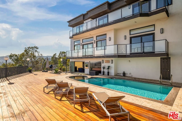 view of swimming pool featuring central AC unit