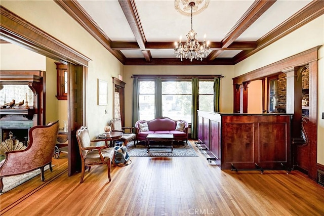 455 W 20th St, Merced, CA 95340 - living area with beamed ceiling, coffered ceiling, a chandelier, and light wood-type flooring
