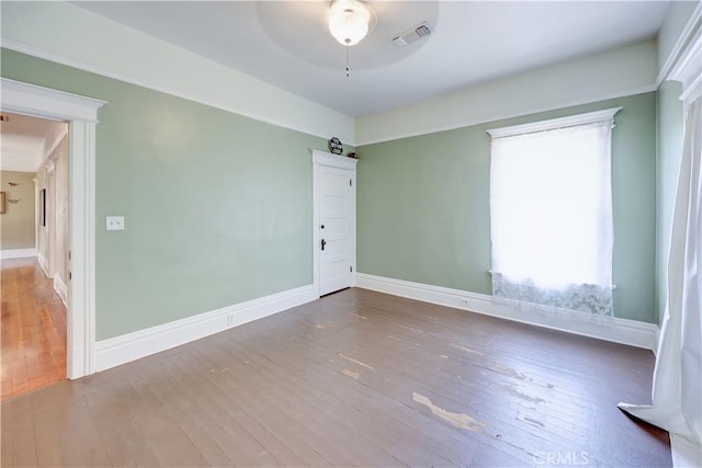455 W 20th St, Merced, CA 95340 - empty room with wood-type flooring and ceiling fan