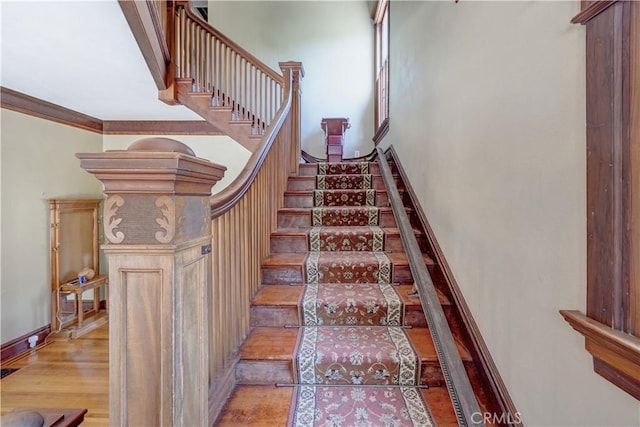 455 W 20th St, Merced, CA 95340 - stairway featuring hardwood / wood-style flooring and crown molding