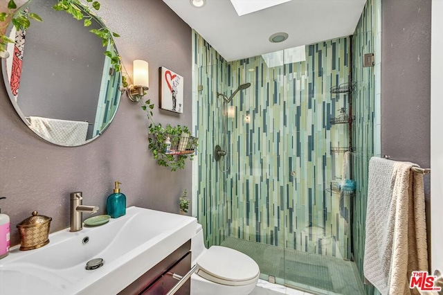 bathroom with walk in shower, vanity, and toilet