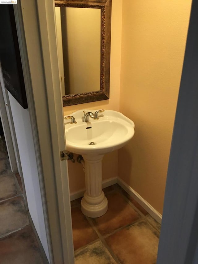 bathroom featuring tile patterned flooring