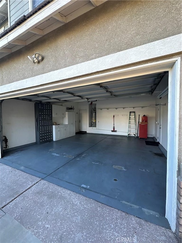 garage featuring gas water heater