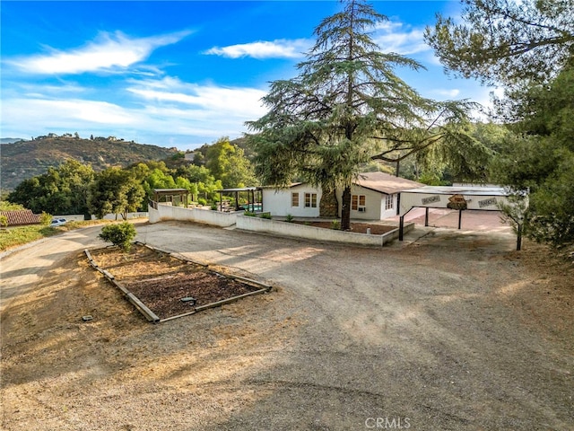 view of front of house with a mountain view