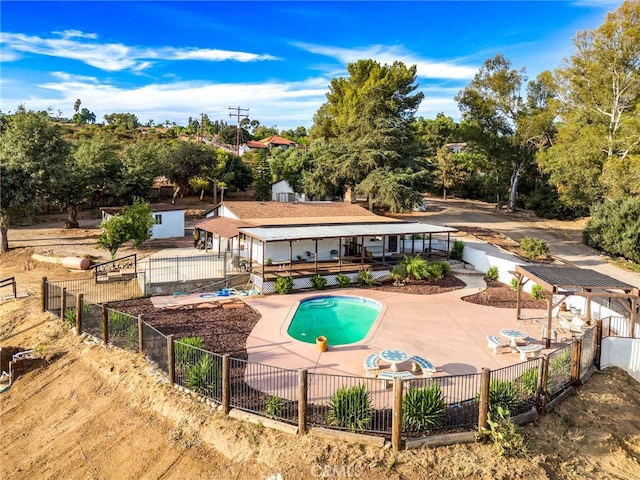 view of pool with a patio