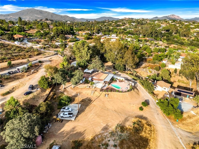 drone / aerial view featuring a mountain view