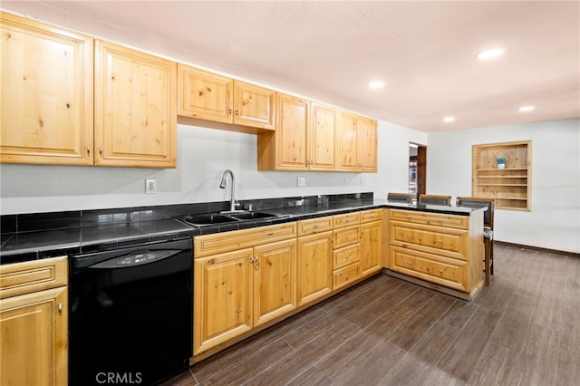 kitchen featuring dark hardwood / wood-style flooring, sink, dishwasher, and light brown cabinets