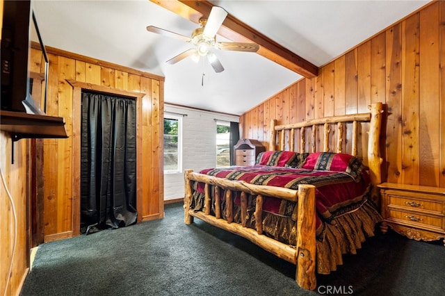 bedroom with wooden walls, lofted ceiling with beams, ceiling fan, and carpet floors