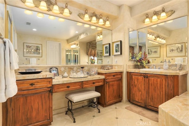 bathroom featuring vanity, tile patterned floors, and decorative backsplash