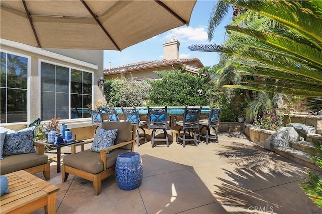 view of patio featuring an outdoor hangout area