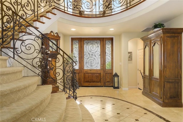 entrance foyer with a high ceiling