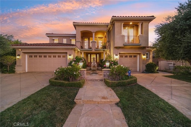 mediterranean / spanish home featuring a balcony