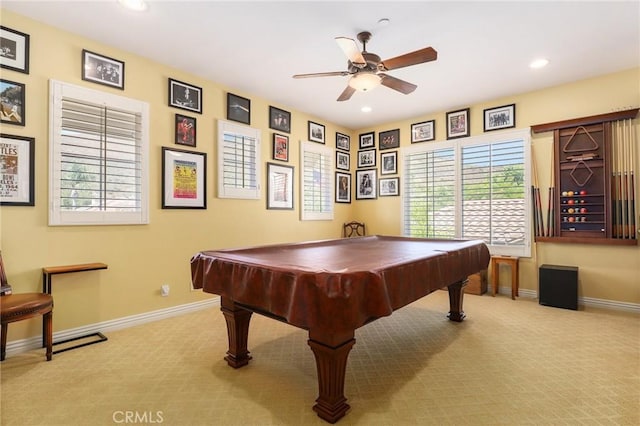 game room featuring light colored carpet, ceiling fan, and billiards