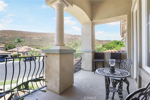 balcony featuring a mountain view