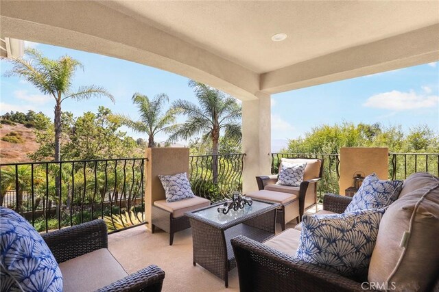 balcony featuring outdoor lounge area