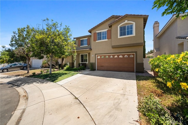 view of front of property featuring a garage