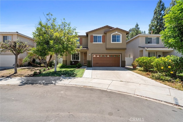 view of front of home with a garage