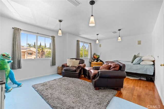 bedroom with light hardwood / wood-style flooring