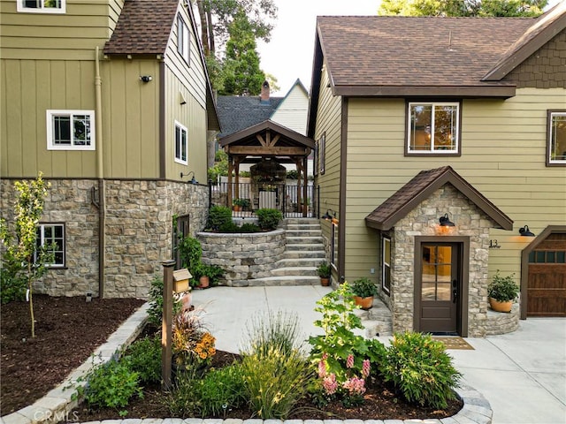 entrance to property with a patio