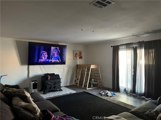 living room with a wood stove