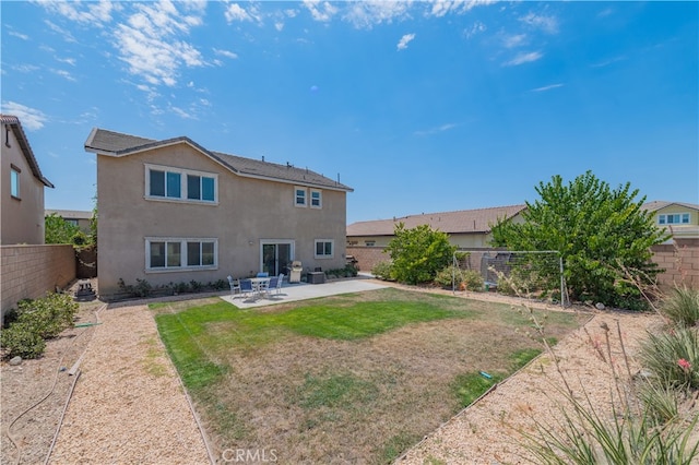 back of house featuring a patio area