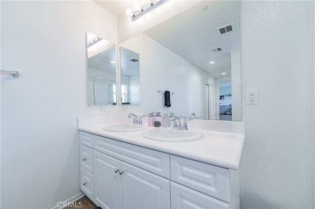 bathroom with double vanity