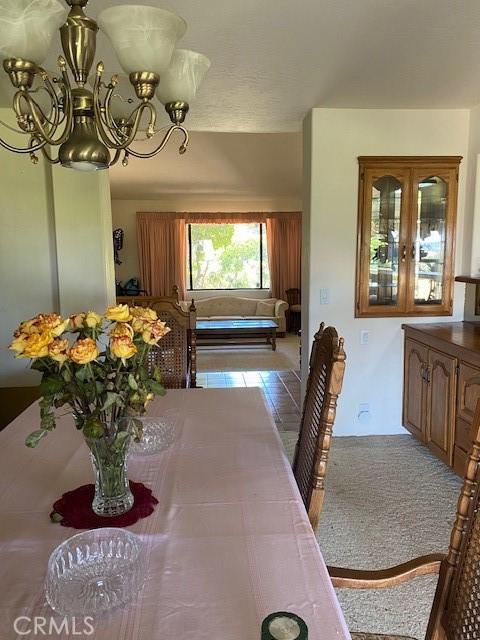 view of carpeted dining space