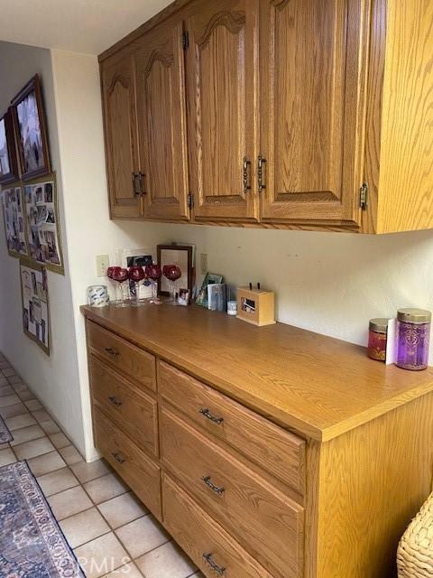 kitchen with light tile patterned floors