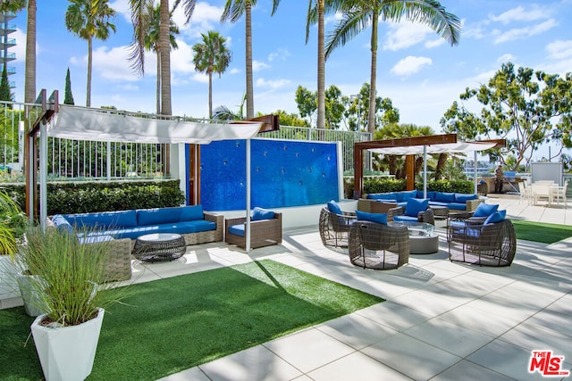 exterior space featuring a pergola and an outdoor hangout area