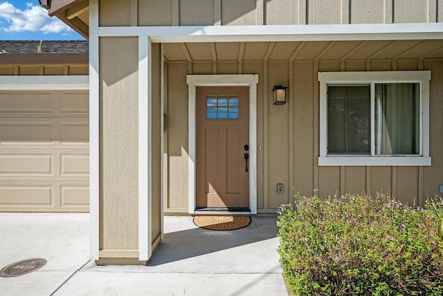 property entrance featuring a garage