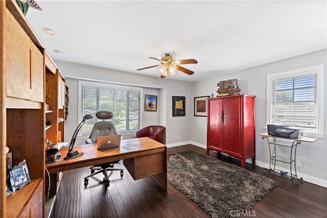 home office featuring ceiling fan and dark hardwood / wood-style floors