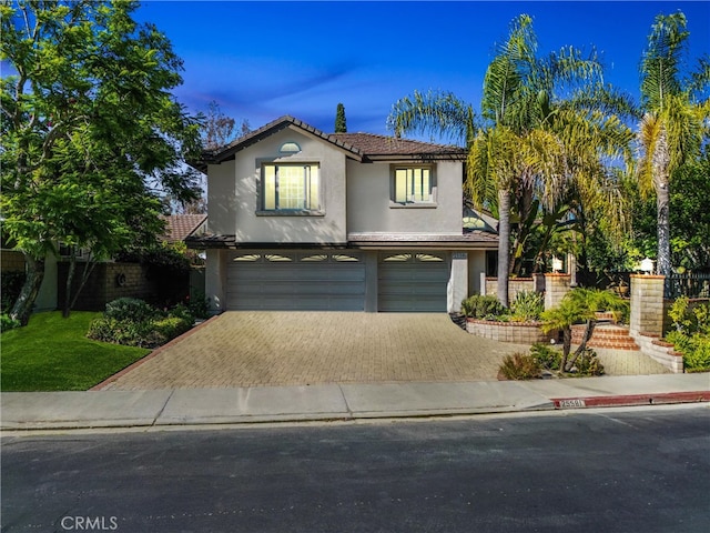 view of front of property with a garage