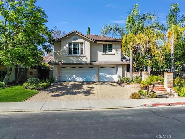 view of front of property featuring a garage