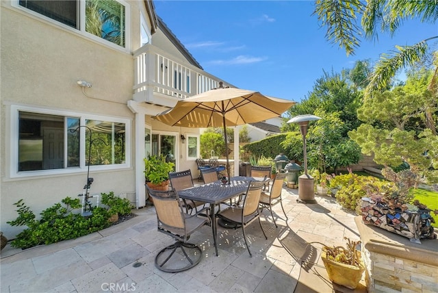 view of patio / terrace with a balcony