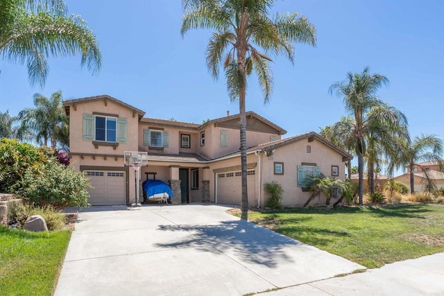 view of front facade featuring a front yard and a garage