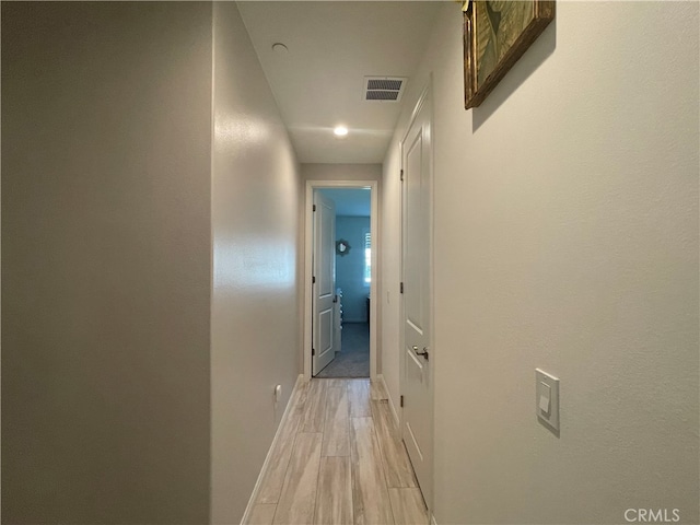 hall featuring light wood-type flooring