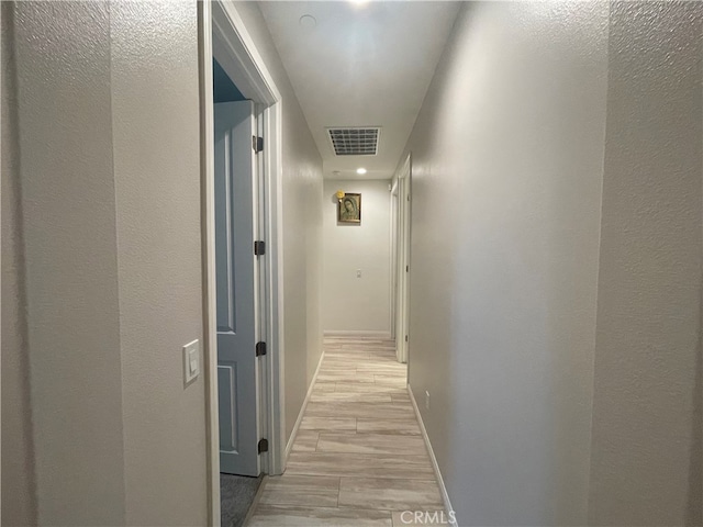 hallway featuring light hardwood / wood-style floors