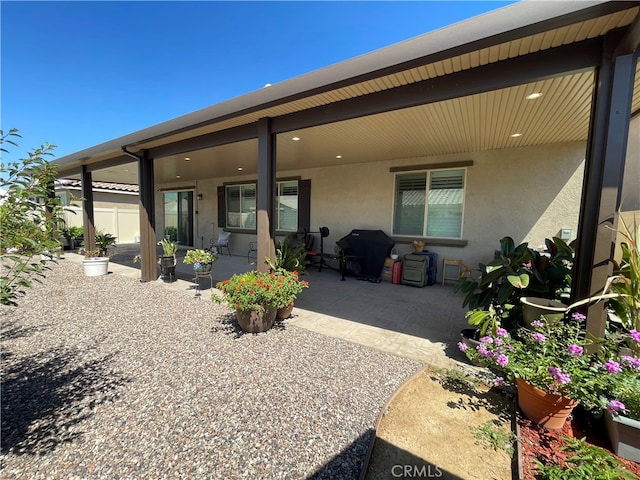 rear view of house with a patio area