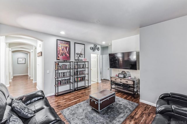 living room with dark wood-type flooring