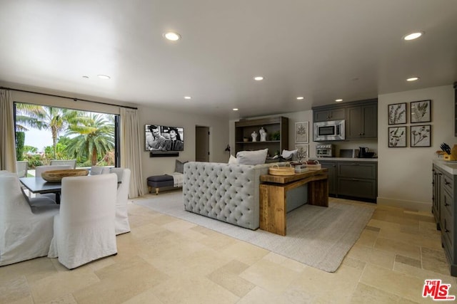 living room with light tile patterned floors