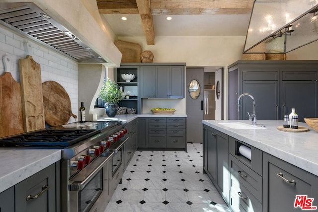 kitchen with custom exhaust hood, gray cabinets, light tile patterned flooring, tasteful backsplash, and double oven range