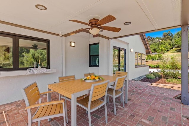 view of patio / terrace featuring ceiling fan