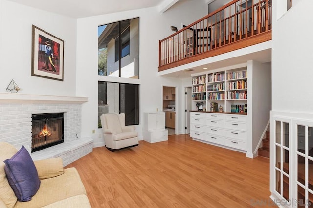 living room featuring hardwood / wood-style floors and a fireplace