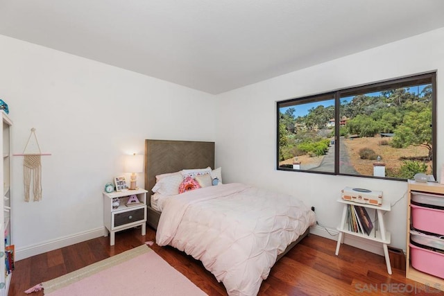 bedroom featuring dark hardwood / wood-style floors