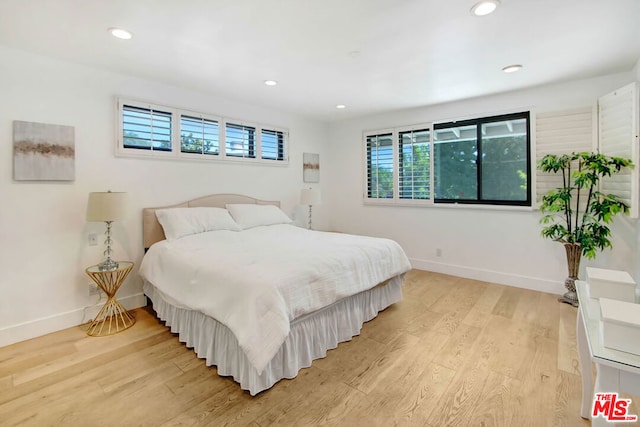 bedroom featuring light hardwood / wood-style flooring