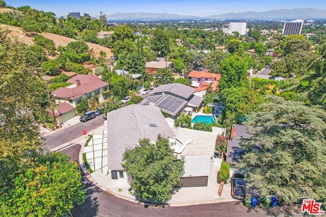 drone / aerial view featuring a mountain view